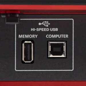 Close-up of a drum module's hi-speed USB memory and computer ports.